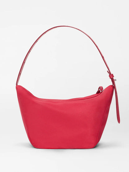 The MZ Wallace Small Waverly Hobo in Apple Bedford is shown against a plain white background, featuring a curved strap, zip-top closure, and Italian leather craftsmanship.