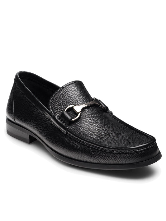 The Magnanni Gentry Soft in Tumbled Black features black leather with a silver buckle, low heel, textured surface, and a cushioned sole for comfort.