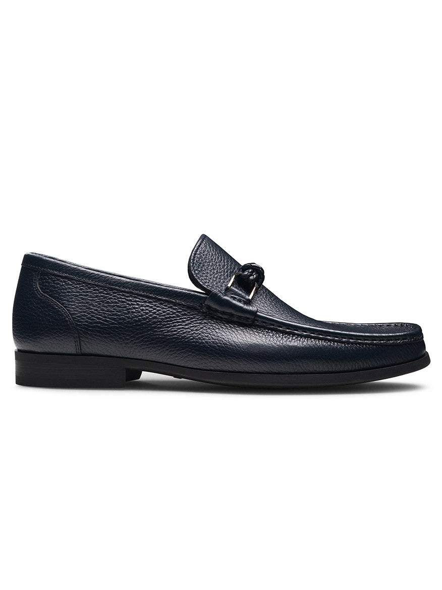 The Magnanni Gentry Soft Braid in Tumbled Navy is a luxury leather loafer with classic moccasin-style stitching and a low heel, shown in profile on a white background.