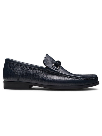 The Magnanni Gentry Soft Braid in Tumbled Navy is a luxury leather loafer with classic moccasin-style stitching and a low heel, shown in profile on a white background.