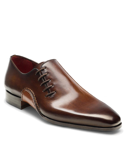 A men's Magnanni Abrahan in Tabaco shoe on a white background.