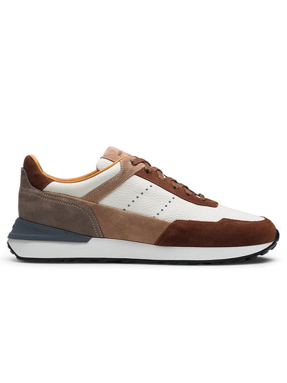 Side view of the Magnanni Bravo sneaker in Castagna Brik/White with white mesh, brown suede accents, and a white sole. The shoe features a lace-up design, cushioned footbed, sport sole, and a grey heel counter.