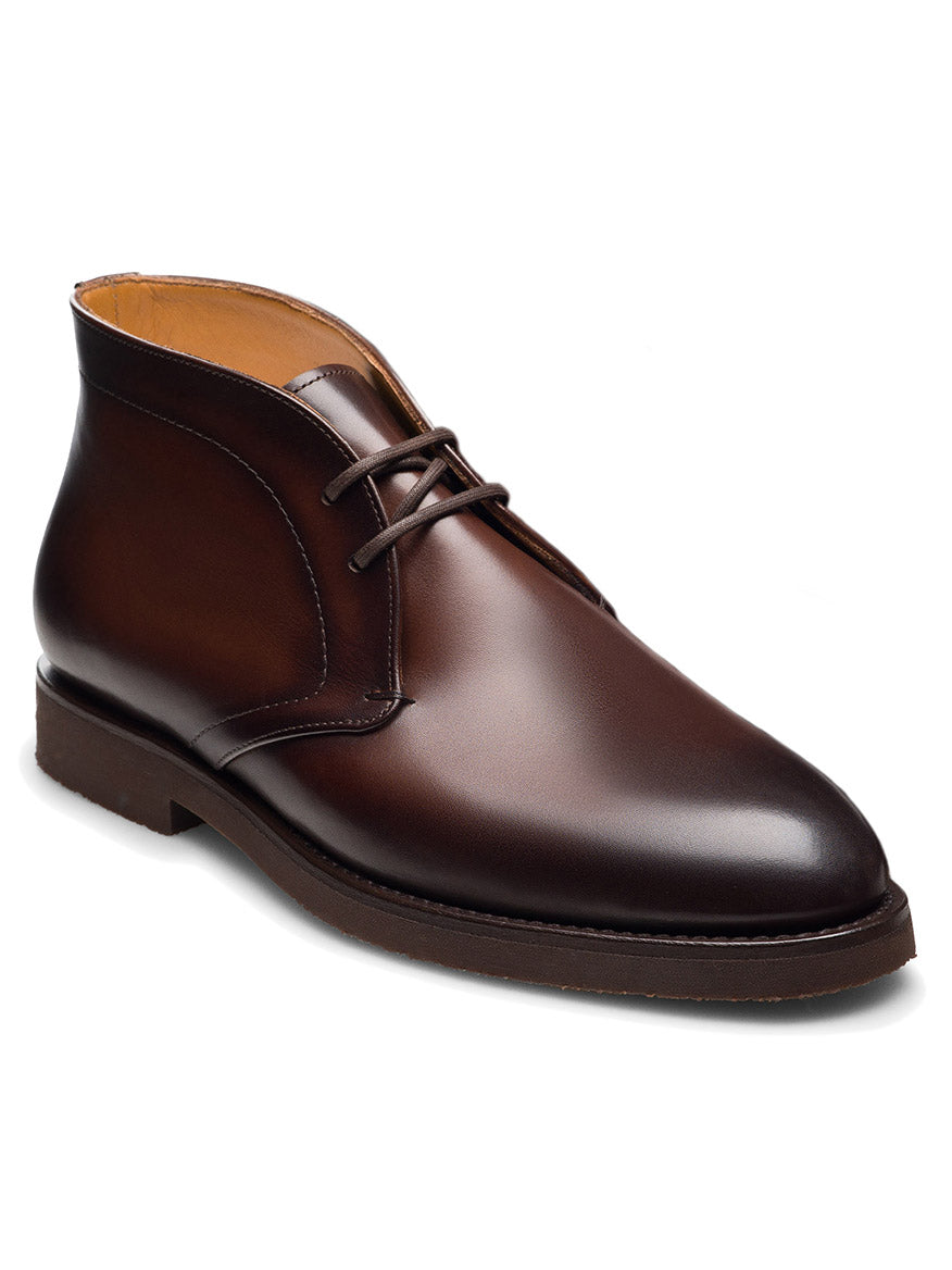 The Magnanni Cervan Chukka in Brown is a single men’s chukka boot, handmade in Spain from brown leather with laces, photographed from a front side angle against a white background.