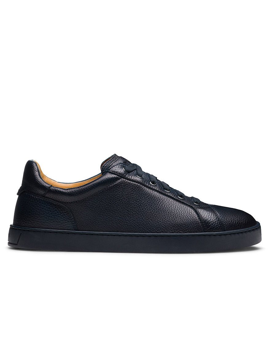 Magnanni Cote Lo Stretch-Lace in Tumbled Navy men’s low-top sneaker, featuring a stretch-lace system and black sole, shown in side profile view.