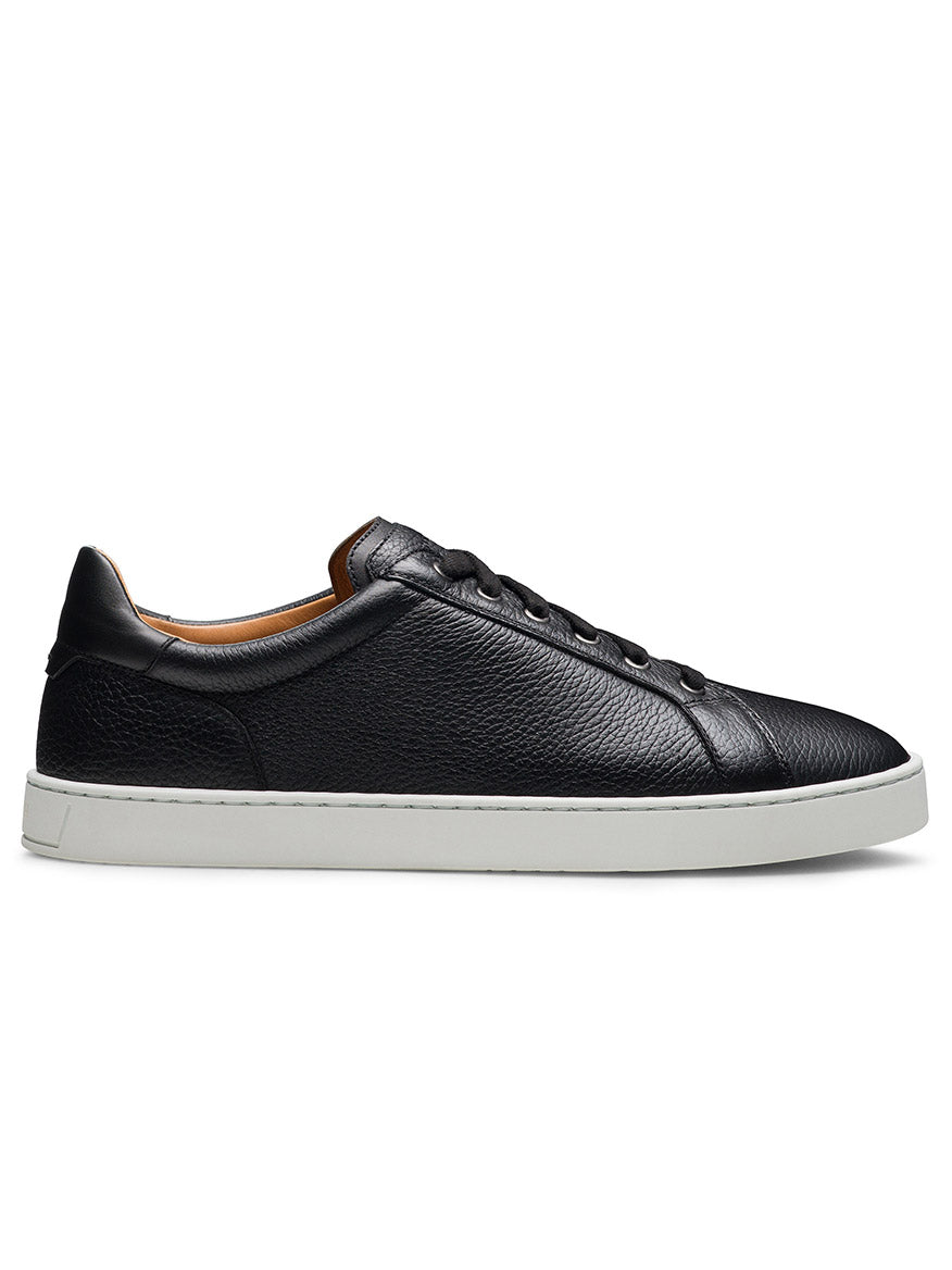 The Magnanni Cote Lo Stretch-Lace in Tumbled Black is a men's black leather low-top sneaker with a stretch-lace system and a white rubber sole, shown in side profile.