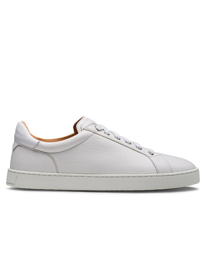 The Magnanni Cote Lo Stretch-Lace in Tumbled White/White is a men's white low-top sneaker with a flat sole, stretch-lace system, and minimal detailing, shown in a side view.