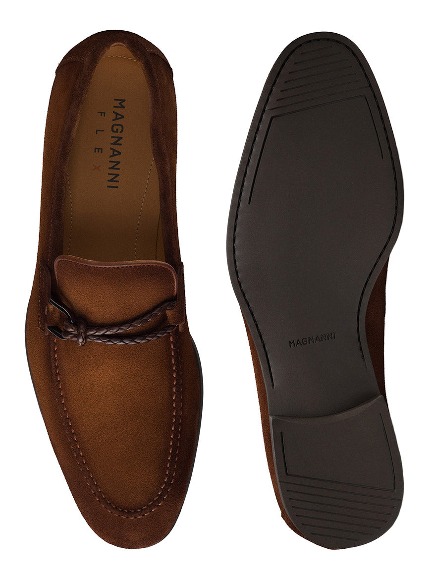 Magnanni Destin in Cognac Suede: These brown suede loafers feature braided leather detailing and rubber soles. One shoe is depicted from the side, while the other is shown from the bottom. As part of the Linea Flex Collection, this contemporary loafer proudly displays the "Magnanni Flex" branding inside.