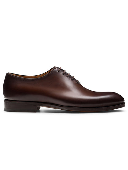 The Magnanni Fleur II in Tabaco is a handmade brown men’s Oxford dress shoe with closed lacing, shown in a side profile view on a white background.