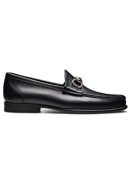 Magnanni Giancarlo in Black: black leather moccasin loafer with low heel and polished bit ornament on the upper, shown against a white background.