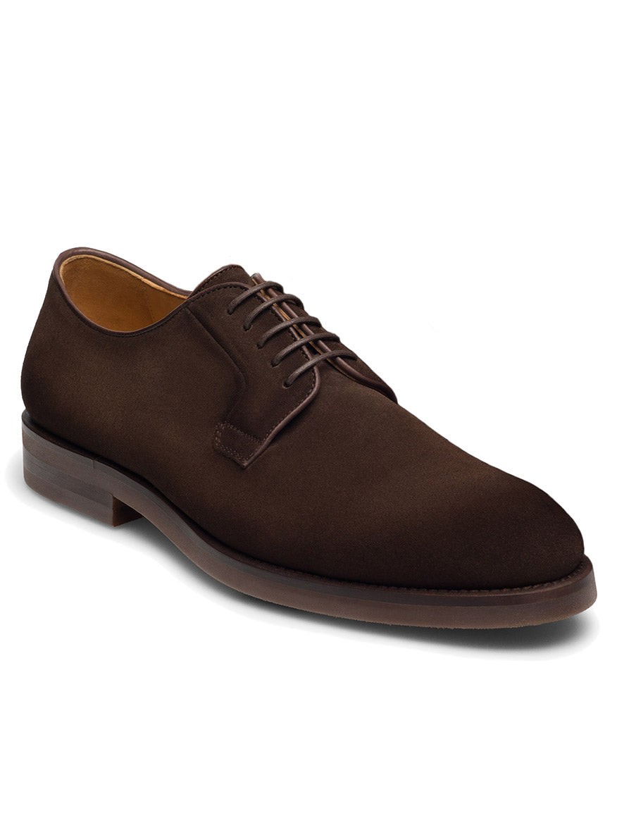 The Magnanni Lanai in Midbrown Suede is a sophisticated dress shoe made from rich brown suede, adorned with laces. It features a low heel and smooth finish, making it ideal for smart-casual wear. The cushioned footbed ensures all-day comfort.