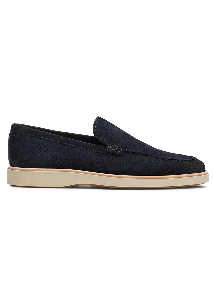 A single navy suede Magnanni Lourenco loafer with a beige, lightweight rubber sole, displayed in a side view.