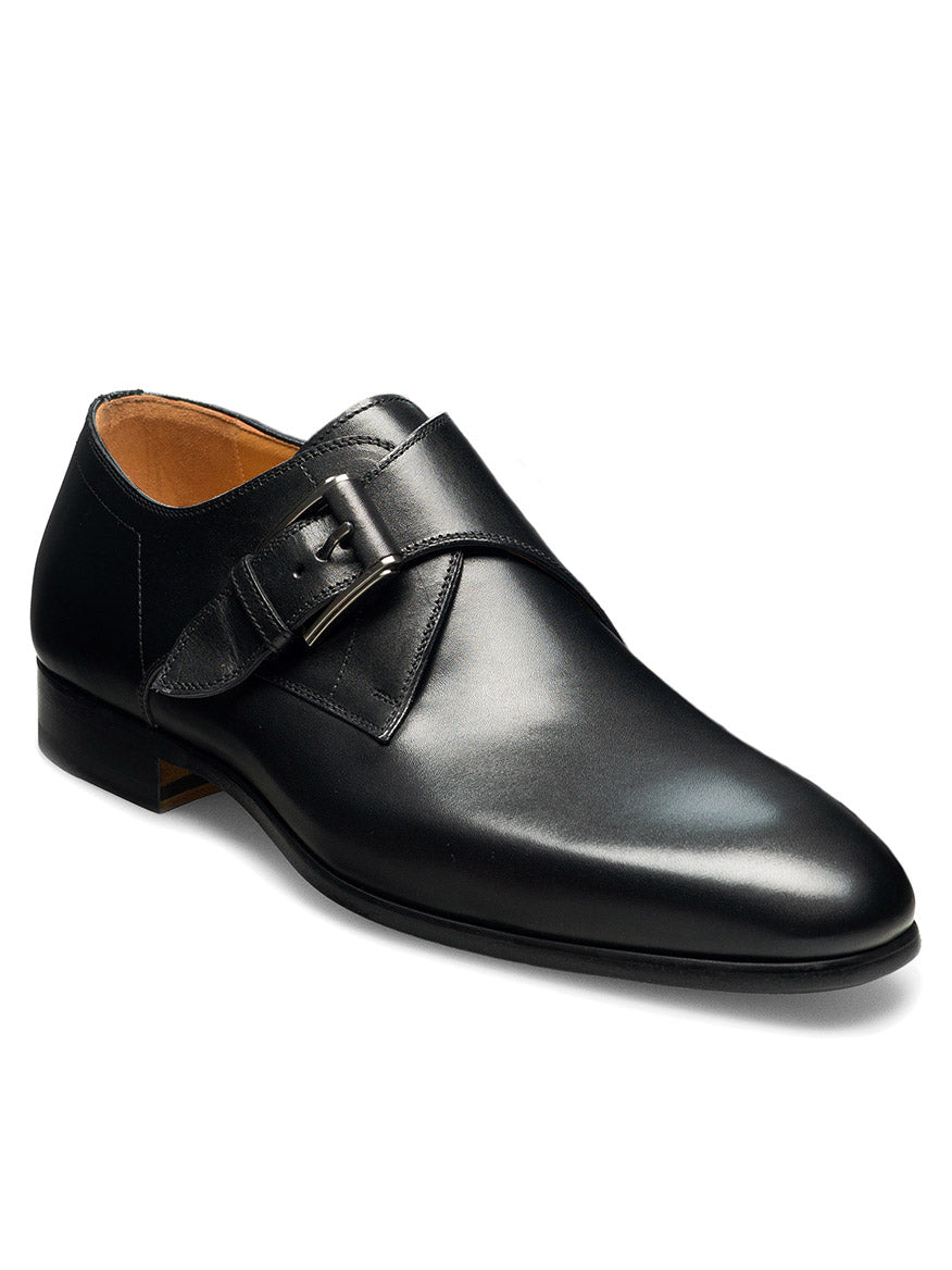 The Magnanni Mansfeld in Black, a black leather dress shoe with a single monk strap detail, featuring a small buckle and a shiny polished finish from the Linea Flex Collection, ensures comfortable wear and is crafted from supple calfskin leather.