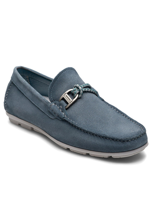 The Magnanni Monterey Braid Bit in Cloud Suede is a blue men's slip-on loafer featuring a braided leather lace, metallic accent, stitched vamp, and light gray rubber sole.