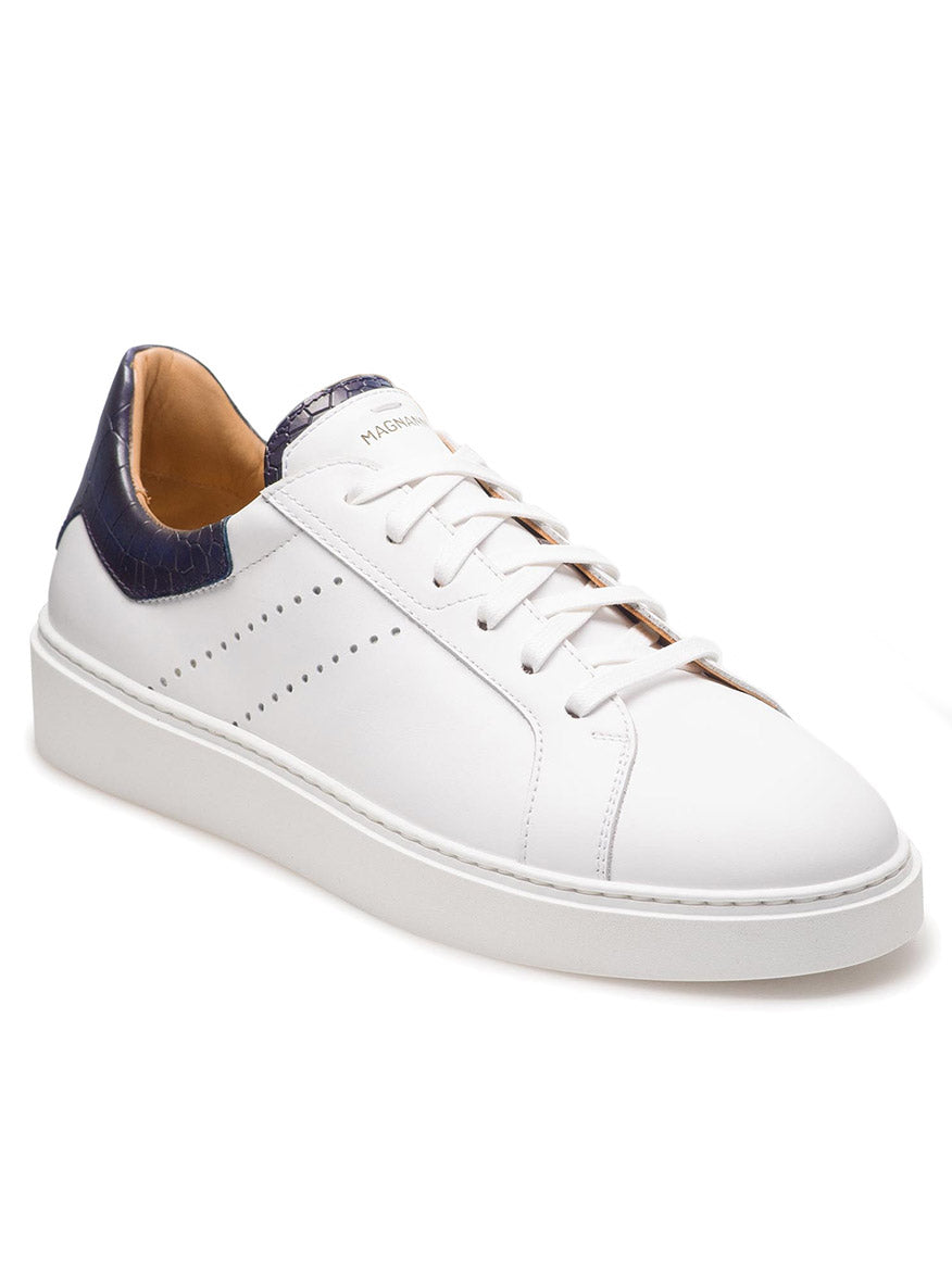 The Magnanni Reina III in White/Navy blends style and quality into a sleek white leather sneaker with navy detailing.