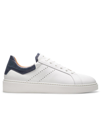 The Magnanni Reina III in White/Navy is a stylish white leather sneaker with navy detailing, showcasing exceptional quality.