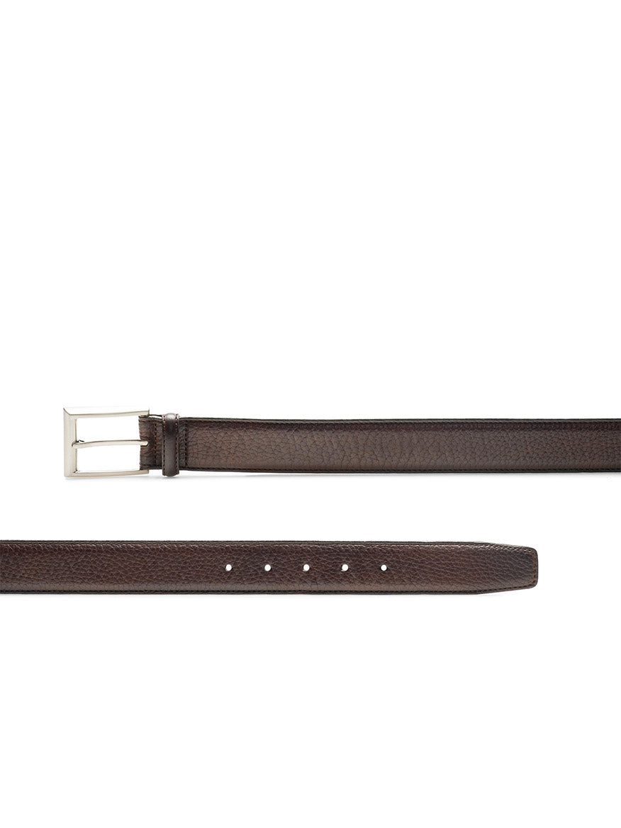 Magnanni Rocas belt in tumbled calfskin leather with silver buckle, unfastened and laid flat against a white background.