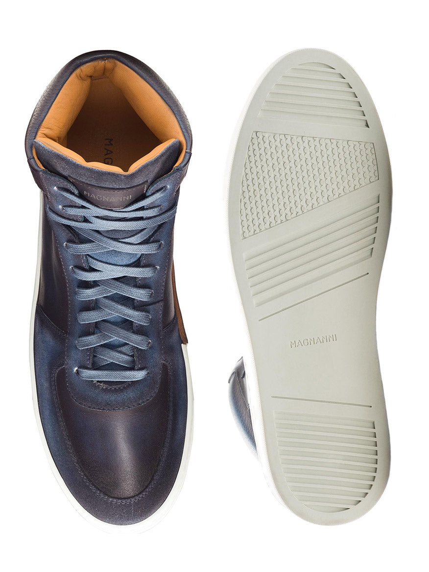 Top view of a pair of Magnanni Rubio in Navy calfskin leather high-top sneakers with laces, one shoe flipped to show the Ottawa sole.