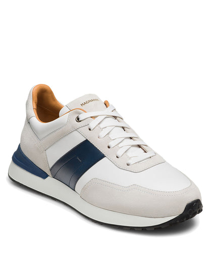 The Magnanni Sentro in White/Navy is a minimalist sneaker crafted from premium full-grain leather, featuring white and beige tones with blue accents, a lace-up front, dark blue side stripe, and black sole for a refined look.