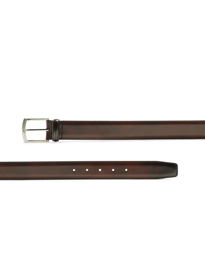 A Magnanni Tanner Belt in Tabaco with a curved silver buckle and five holes for adjustment, made in Spain.