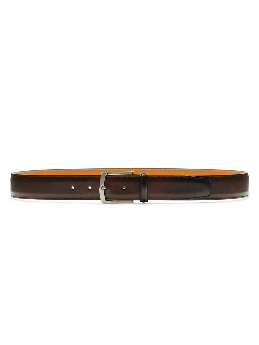 A Magnanni Tanner Belt in Tabaco with a silver curved buckle, made in Spain, laid out flat on a white background.