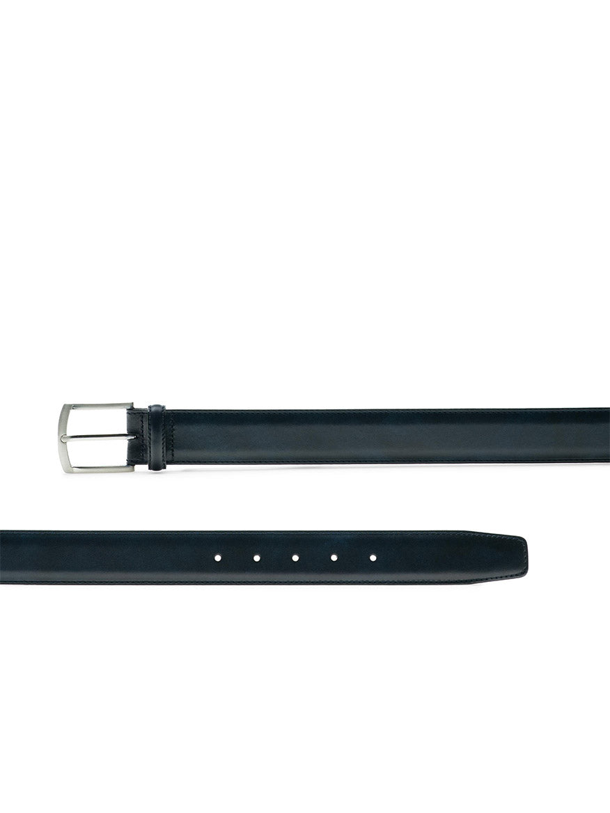 Navy calfskin leather Magnanni Tanner belt with a silver buckle on a white background.