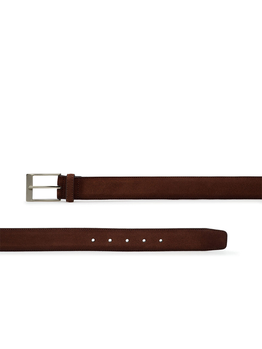 The Magnanni Telante Belt in Castagna Brik Suede features rich brown suede and a silver rectangular buckle—blending timeless style and versatility, it’s a must-have accessory for any wardrobe.