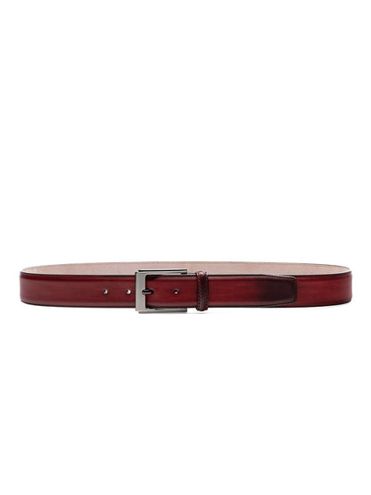 A Magnanni Vega Belt in Red calfskin leather belt featuring an Arcade patina on a white background.