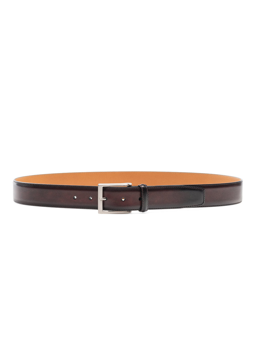 A Magnanni Viento Belt in Burgundy made of calfskin leather with a brushed nickel buckle, showcased on a white background.