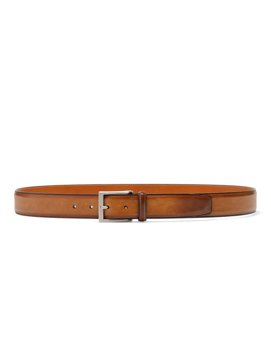 Magnanni Viento Belt in Cuero calfskin leather belt with a metallic buckle against a white background.