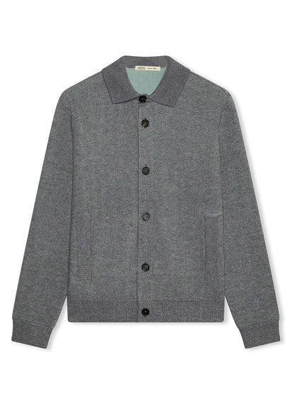 The Maurizio Baldassari Pique Knit Cashmere Blend Blouson in Light Grey features a collared design with two side pockets, ribbed cuffs, and hem, shown laid flat on a white background.