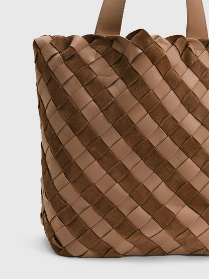 A tan Naghedi Como Shopper Tote Suede & Neoprene in Canyon with a woven pattern of alternating suede and smooth strips.
