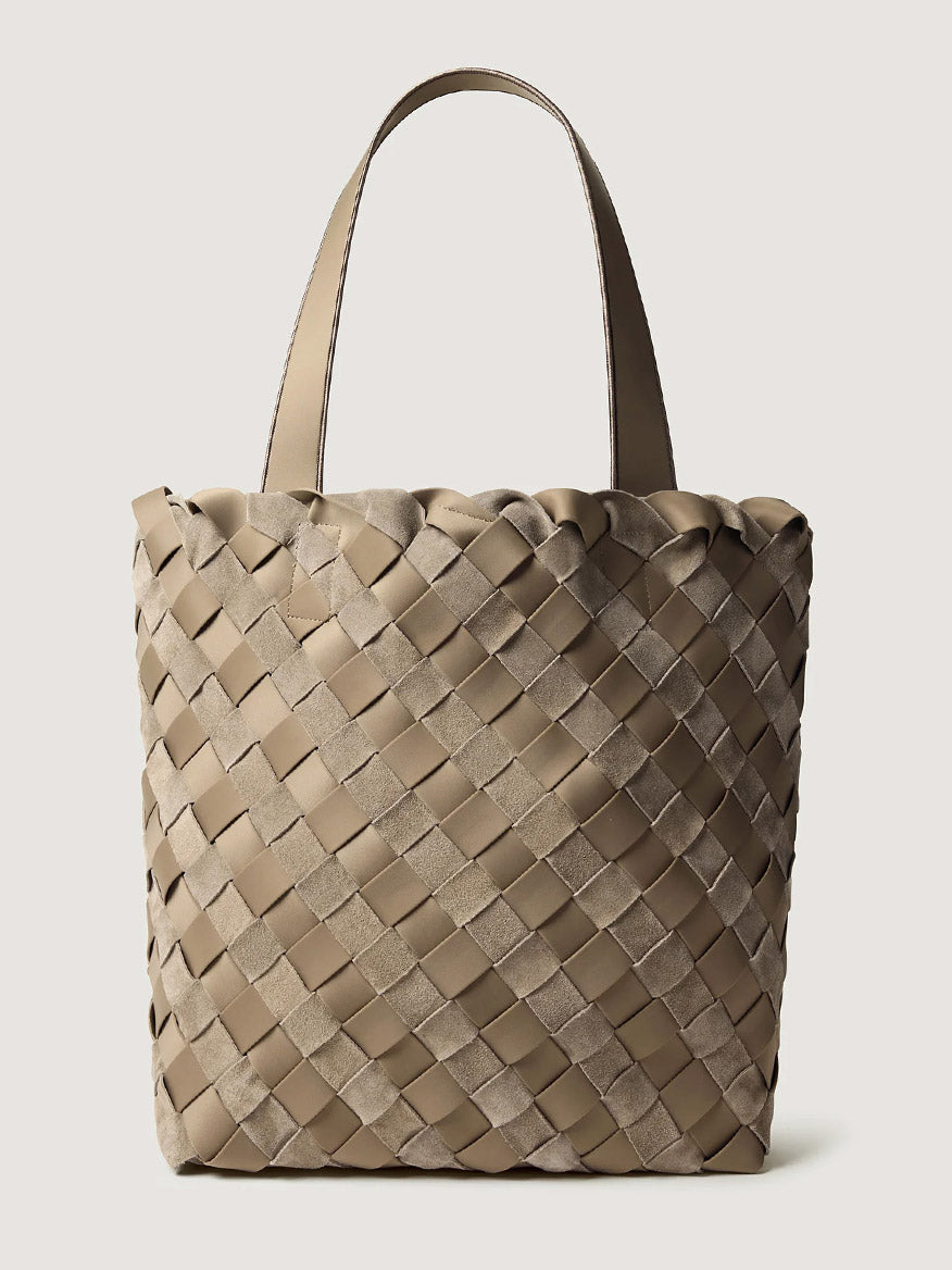 Naghedi Como Shopper Tote Suede & Neoprene in Bluff, a beige tote made of interwoven strips of suede and smooth material with two shoulder straps.