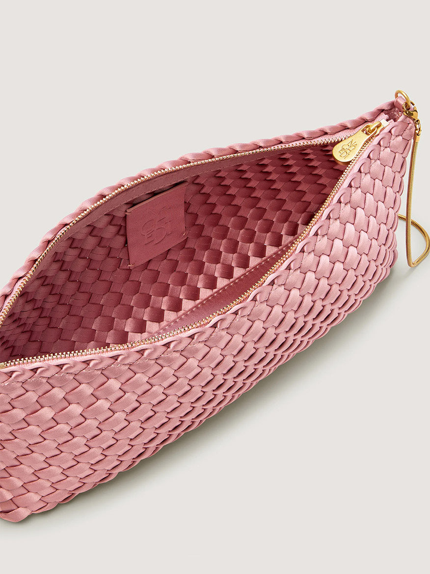 Naghedi Gala Clutch Satin in Flor made of ballet pink woven ribbon with a gold zipper and chain strap.