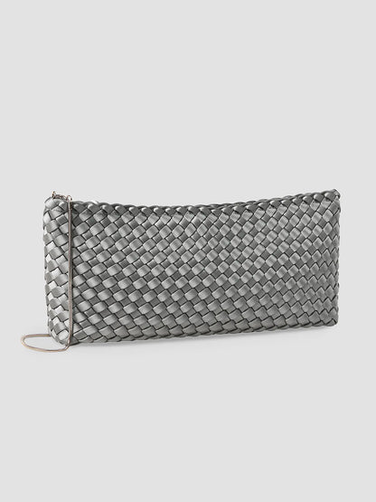 A Naghedi Gala Clutch Satin in Graphite, featuring a dark gray woven design with a thin shoulder strap.