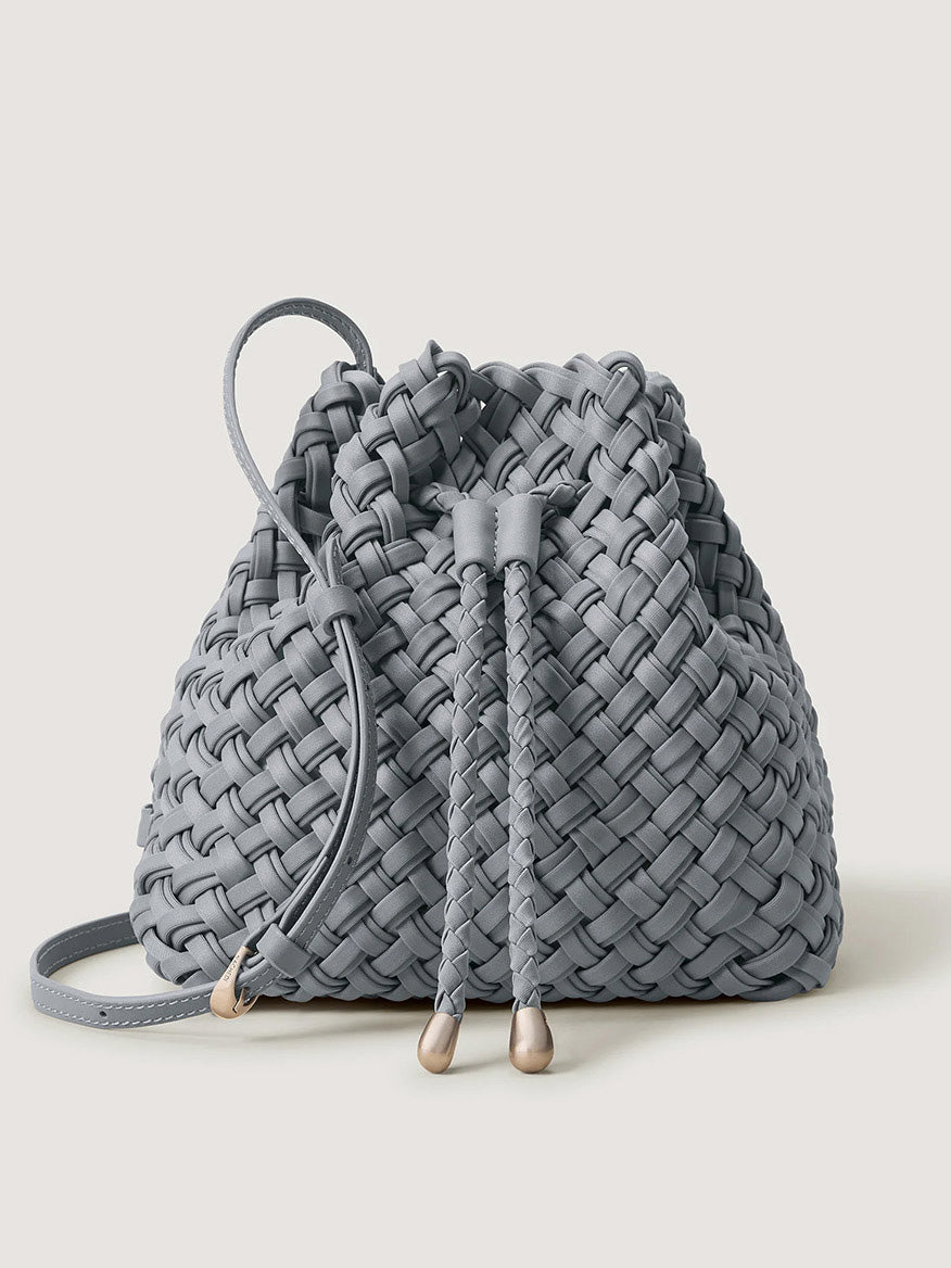 Naghedi Gramercy Bucket Double Weave in Marina blue-grey handwoven bucket bag with a drawstring closure and an adjustable shoulder strap.
