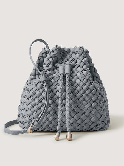 Naghedi Gramercy Bucket Double Weave in Marina blue-grey handwoven bucket bag with a drawstring closure and an adjustable shoulder strap.