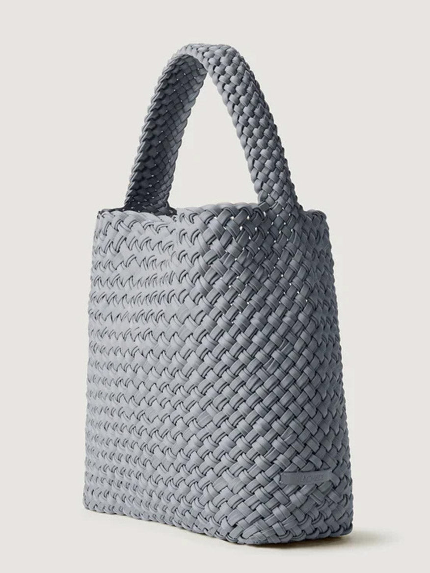 Marina Naghedi Nomad Medium Hobo Double Weave bag with a light blue all-over woven texture and a single top handle.