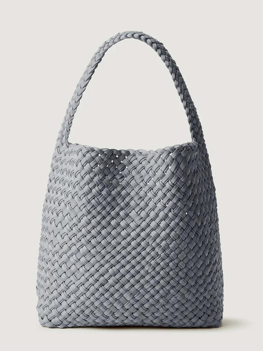 Blue-grey Naghedi Nomad Medium Hobo Double Weave in Marina bag featuring a handwoven texture and a braided handle.