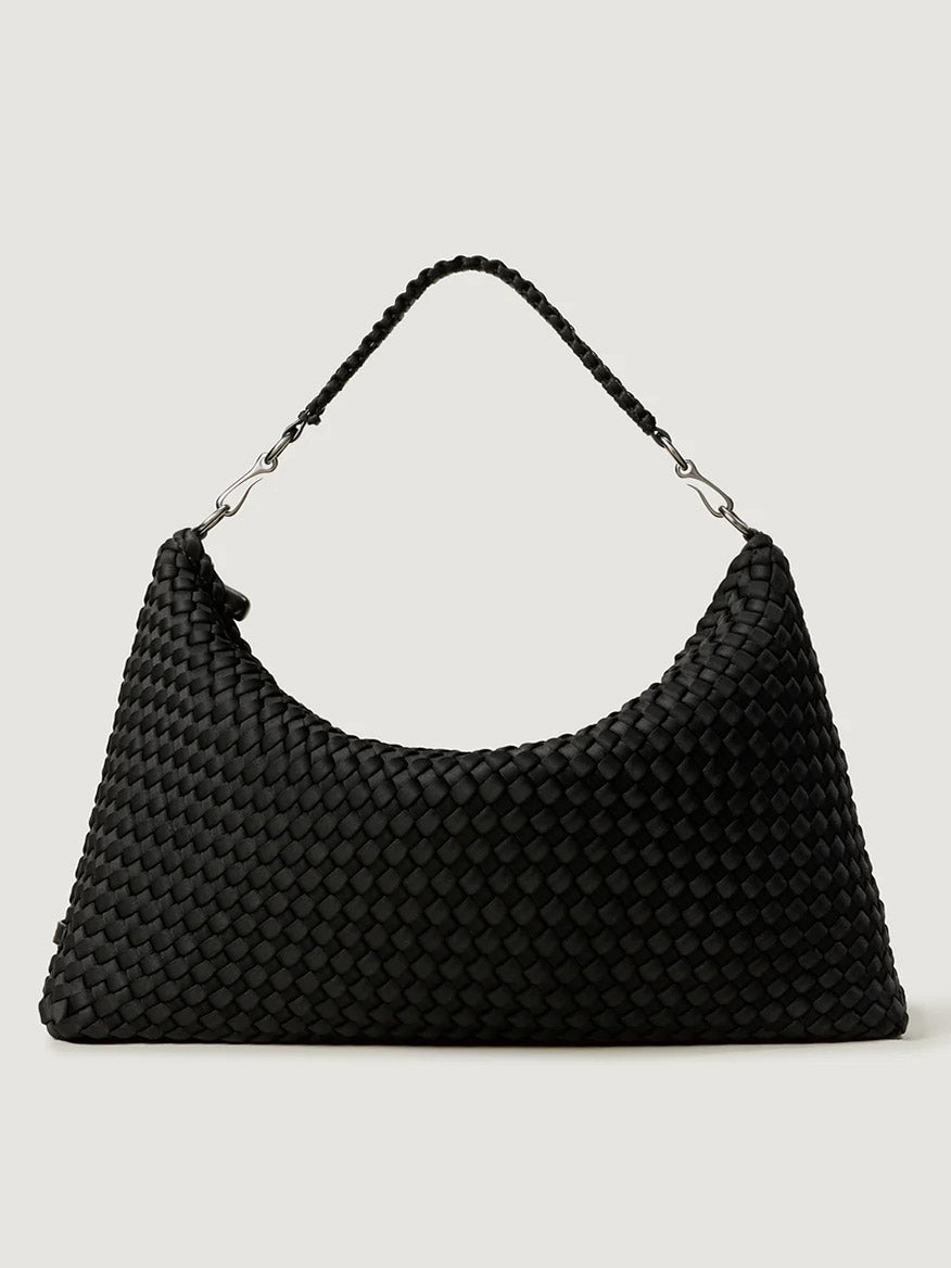 The Naghedi Porto Medium Half-Moon Bag in Onyx is a black handwoven shoulder bag with a short handle and silver hardware, shown against a plain light background.