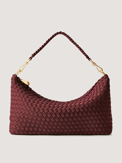 Naghedi Porto Small Half-Moon Bag in bordeaux, a deep red handwoven shoulder bag with gold-tone hardware.