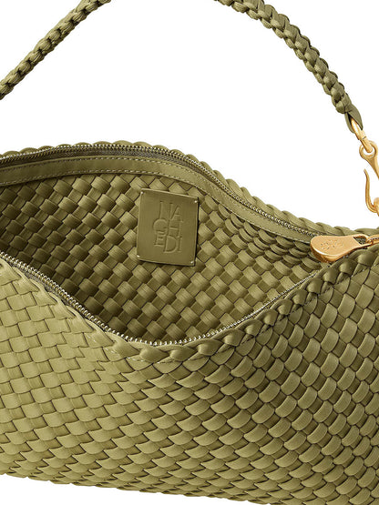 Close-up of a half-moon shaped Naghedi Porto Small Half-Moon Bag in Bottle Green, featuring a braided handle and an interior brand label.