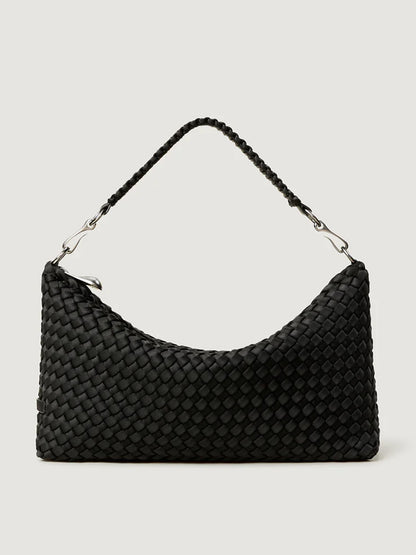 The Naghedi Porto Small Half-Moon Bag in Onyx features a black handwoven neoprene design, a single braided strap, and silver-tone hardware, shown against a plain light background.