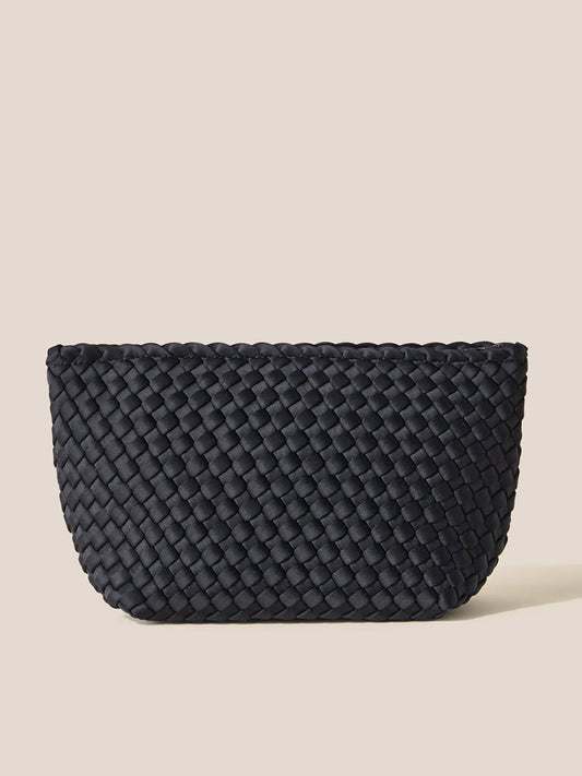 A Naghedi Portofino Cosmetic Clutch in Solid Onyx featuring handwoven neoprene material on a beige background.