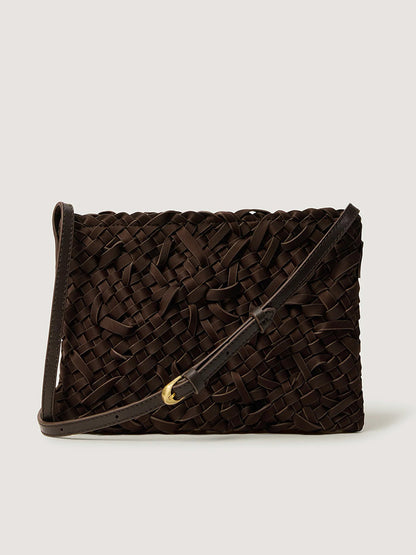 Chocolate Naghedi Soho Crossbody Nest Weave bag with an adjustable strap and gold-tone buckle.