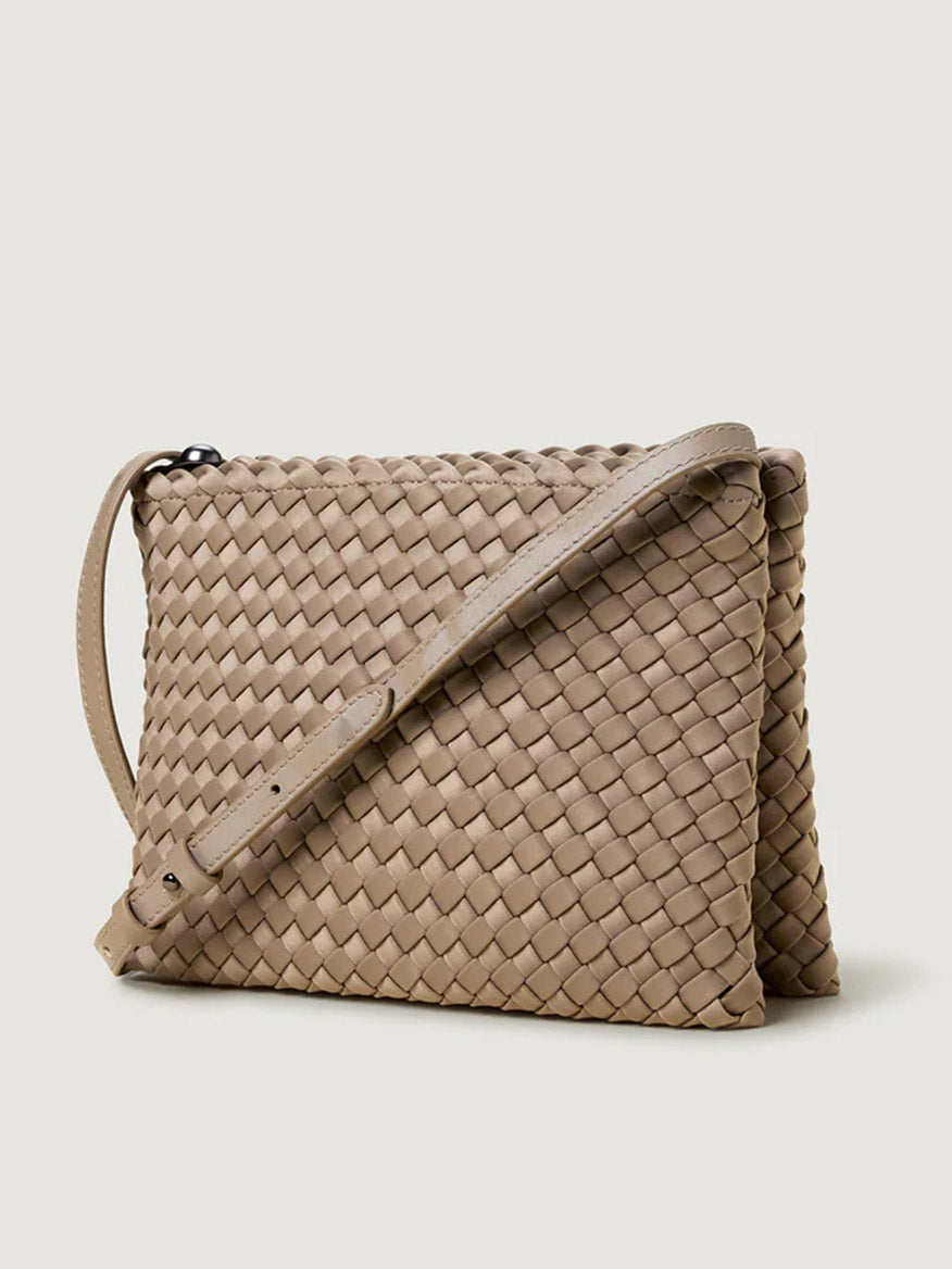 Naghedi Soho Envelope Crossbody in Cashmere, featuring a woven neoprene pattern and adjustable leather strap, displayed against a plain light background.