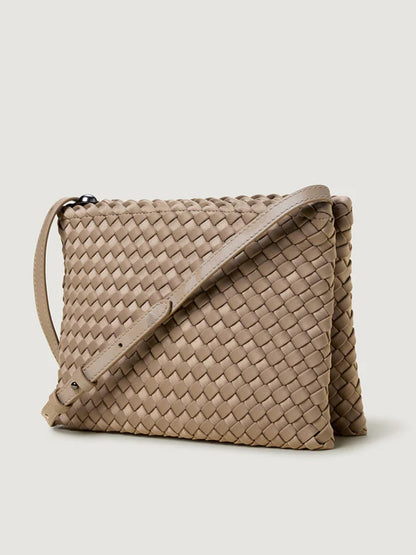 Naghedi Soho Envelope Crossbody in Cashmere, featuring a woven neoprene pattern and adjustable leather strap, displayed against a plain light background.