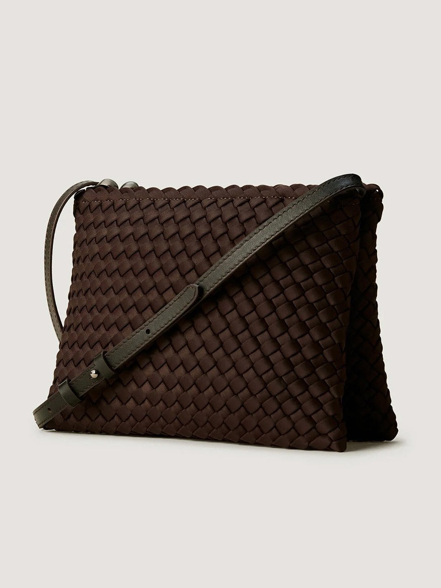Naghedi Soho Envelope Crossbody in Chocolate, a dark brown handwoven neoprene crossbody bag with an adjustable shoulder strap.