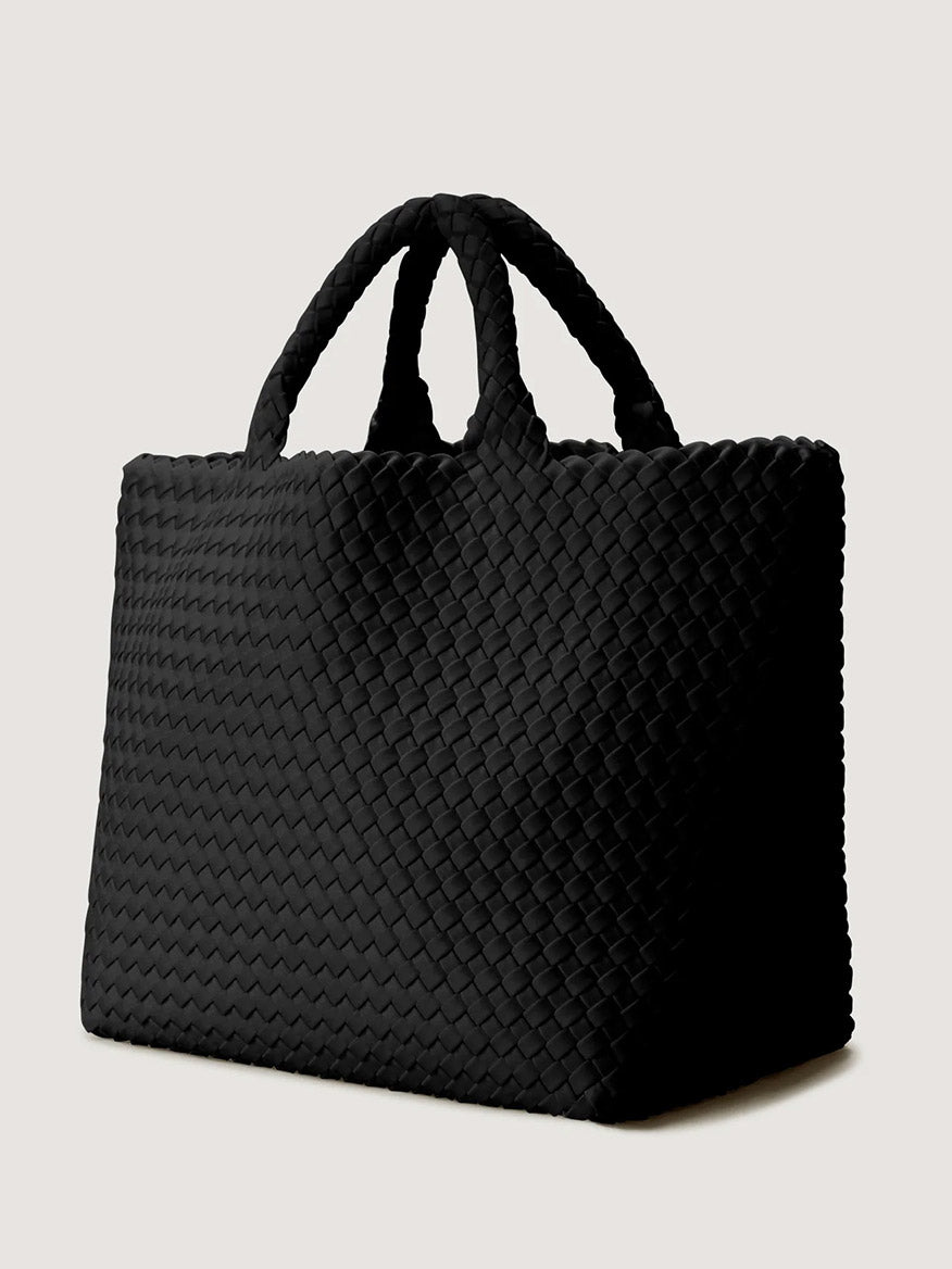 Naghedi St. Barths Medium Tote in Onyx neoprene bag with a black woven design and two top handles.
