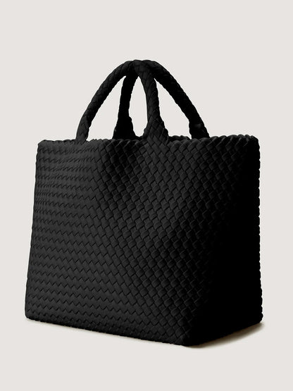Naghedi St. Barths Medium Tote in Onyx neoprene bag with a black woven design and two top handles.