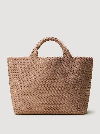 Naghedi St. Barths Medium Tote in Seychelles, a muted pink neoprene bag with a woven pattern and two top handles.